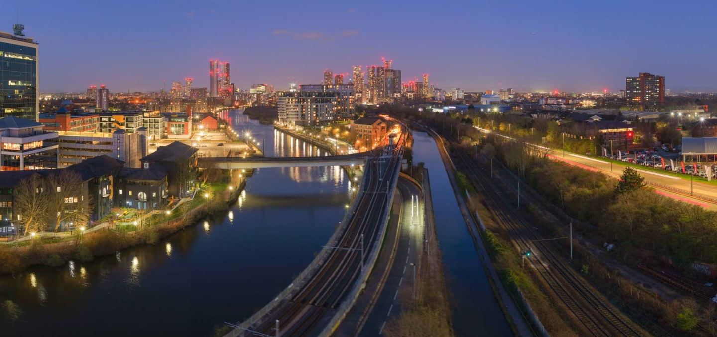 Manchester and Salford at dusk, looking along the Irwell