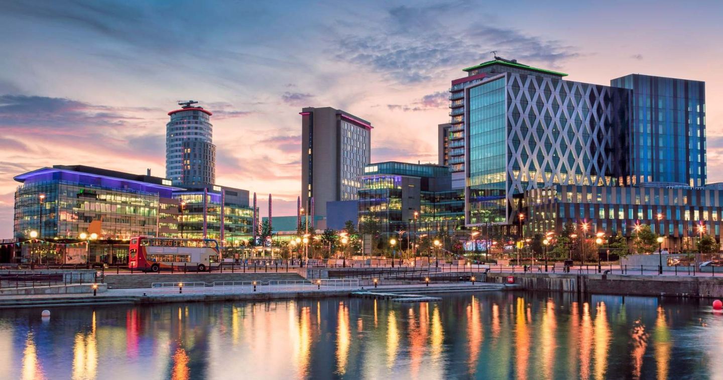 MediaCityUK at sunset, across the Salford Quays basin